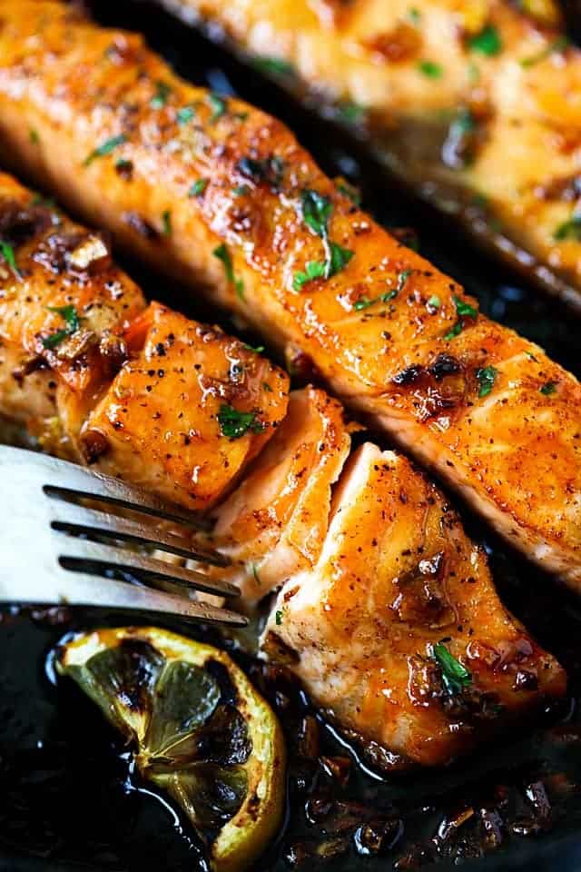 Slicked salmon with lots of sauce 