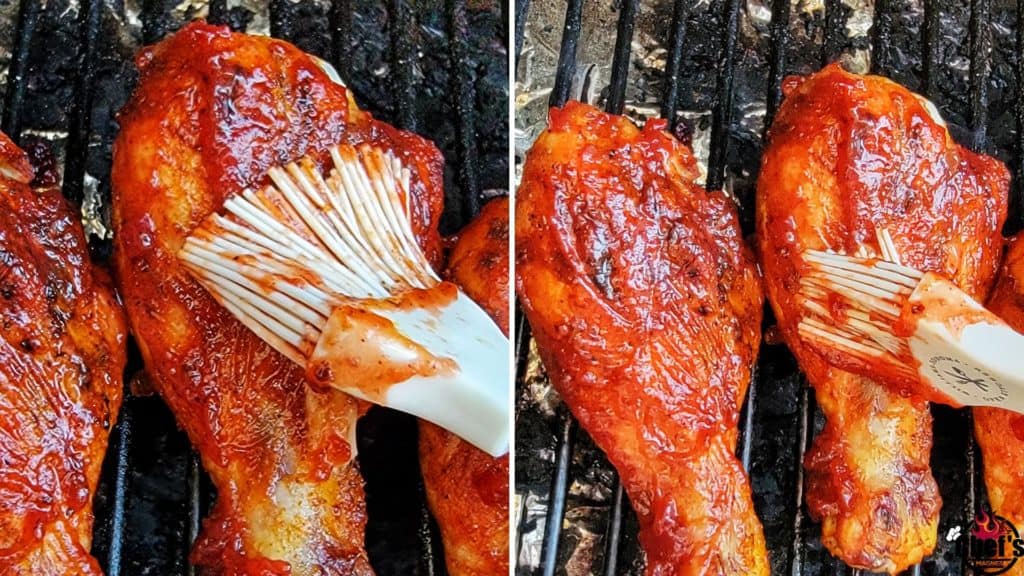 Applying glaze to chicken drumsticks on grill