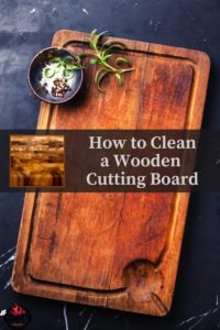 Wood cutting board on dark background Pinterest Pin